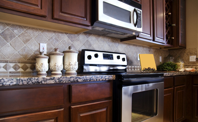 New Uses Kitchen With Dark Brown Cabinetry Stainless Steel