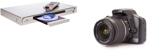 New Uses electronics: silver DVD player with DVD in tray and remote control on top, large digital camera with nice lens